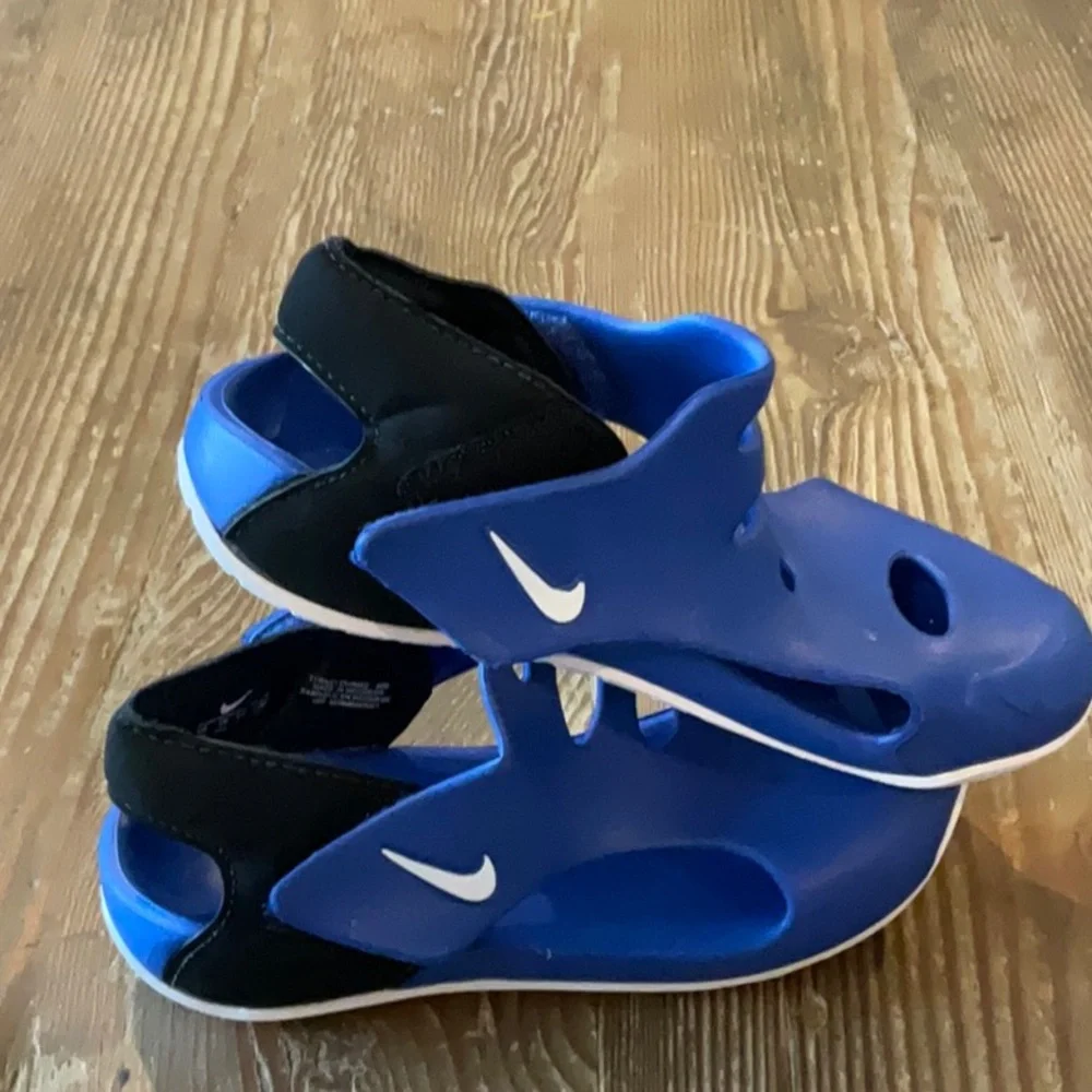 Nike Kids Blue Slip-On Water Shoes with White Swoosh size 11c